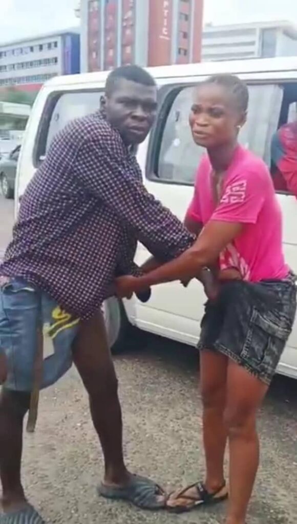 Screenshot from viral video of Friday Onu assaulting a commercial driver.
