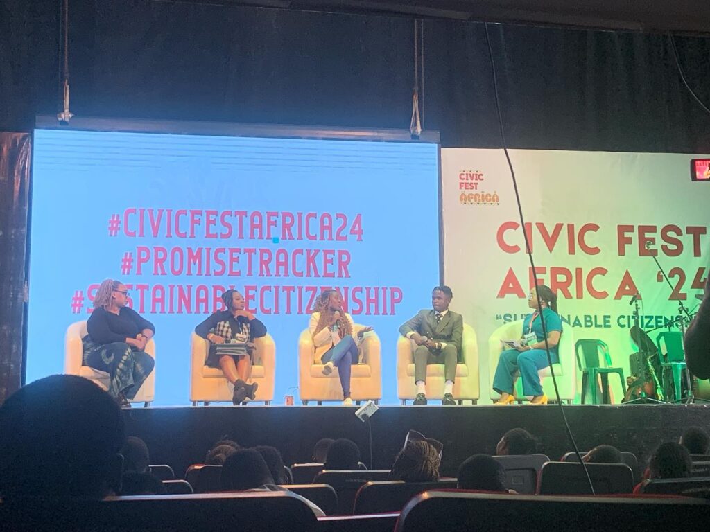 A photo of the pannelists while on stage speaking on sustianable citizenship at Civic Fest Africa