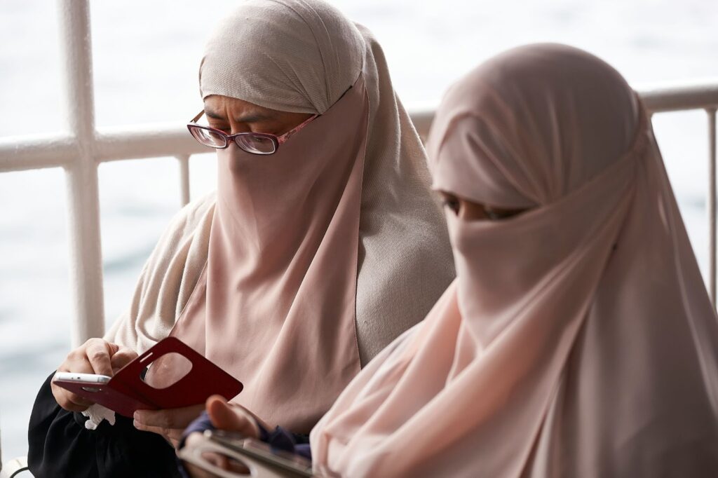 an image of two women on hijab