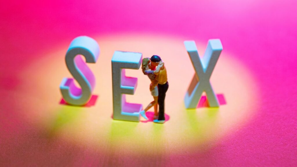 an image of SEX with a couple