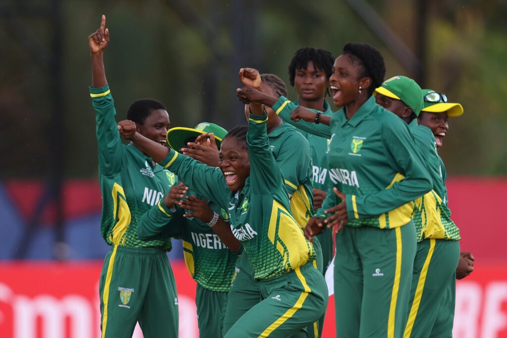 Junior Female Yellow Greens celebrating victory.