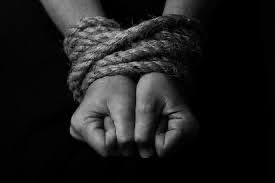 Hands tied by a rope