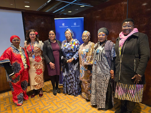 A photo of women, including Minster Imaan from the CSW69 conference.