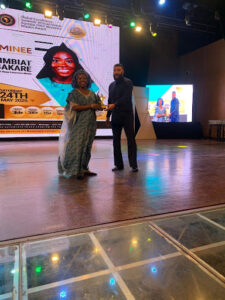 Simbiat accepting her award