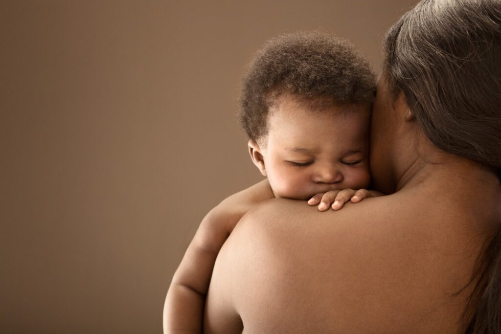 Woman Holding Baby.