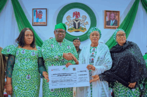 First Lady Oluremi Tinubu donated the check to Mr. Caleb Mutfwang. Photo Source: @KukoyiBusola.