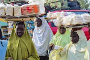 Nigerian young girls hawking. Photo credit: Web