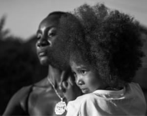 Mother and Child. Photo Source: Lisa Marie Theck from Unsplash