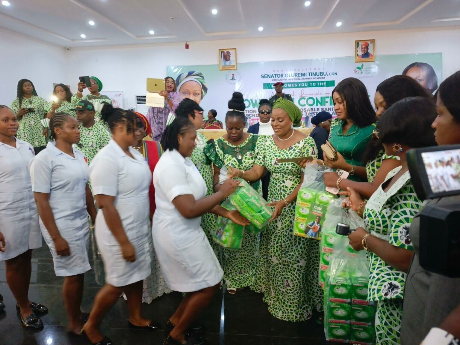 Anambra first Lady, Nonye Soludo, distributing the pad packs to the teenage girls at the Banquet Hall of the Light House. Photo Credit: Ikenna Obianeri