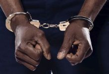 A handcuffed man. Photo credit: Web