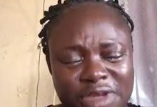 Screenshot from video of the woman weeping bitterly