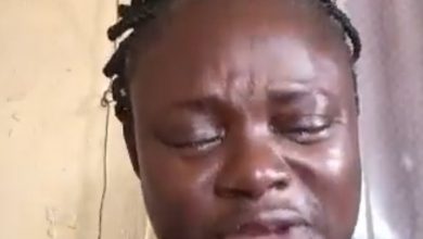 Screenshot from video of the woman weeping bitterly