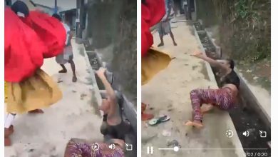 Picture of the woman being beaten by masquerade. Photo credit: SaharaReporters on X