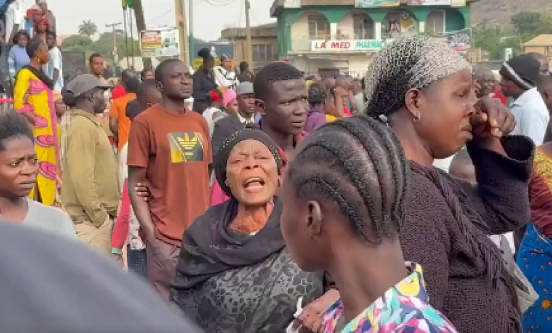 Screenshot from viral video of elderly women crying out