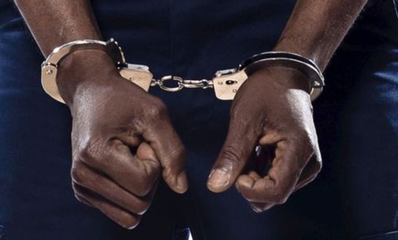 A handcuffed Man Photo credit: Web