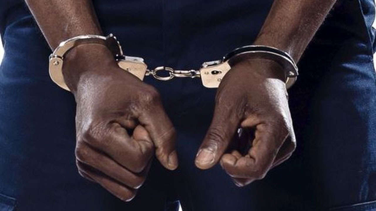 A handcuffed Man Photo credit: Web