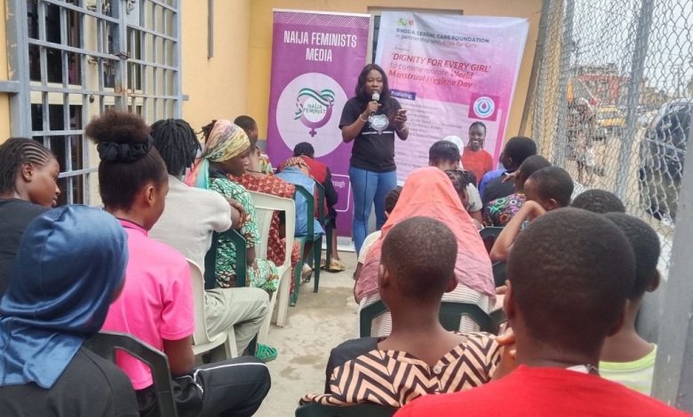 NFM founding director Simbiat Bakare training girls on World Menstrual Hygiene Day 2026. Source: Naija Feminist Media