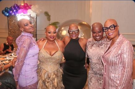 Video of bald women's gala falsely captioned as “club of widows under 50”